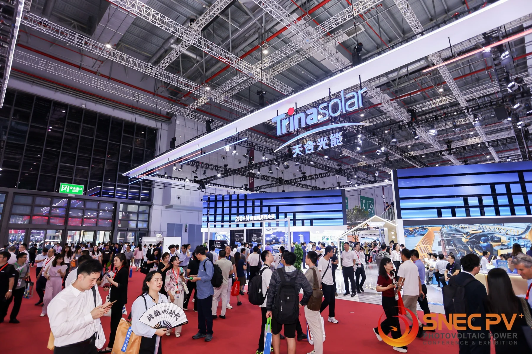 Large Trina Solar booth with international visitors at SNEC Shanghai