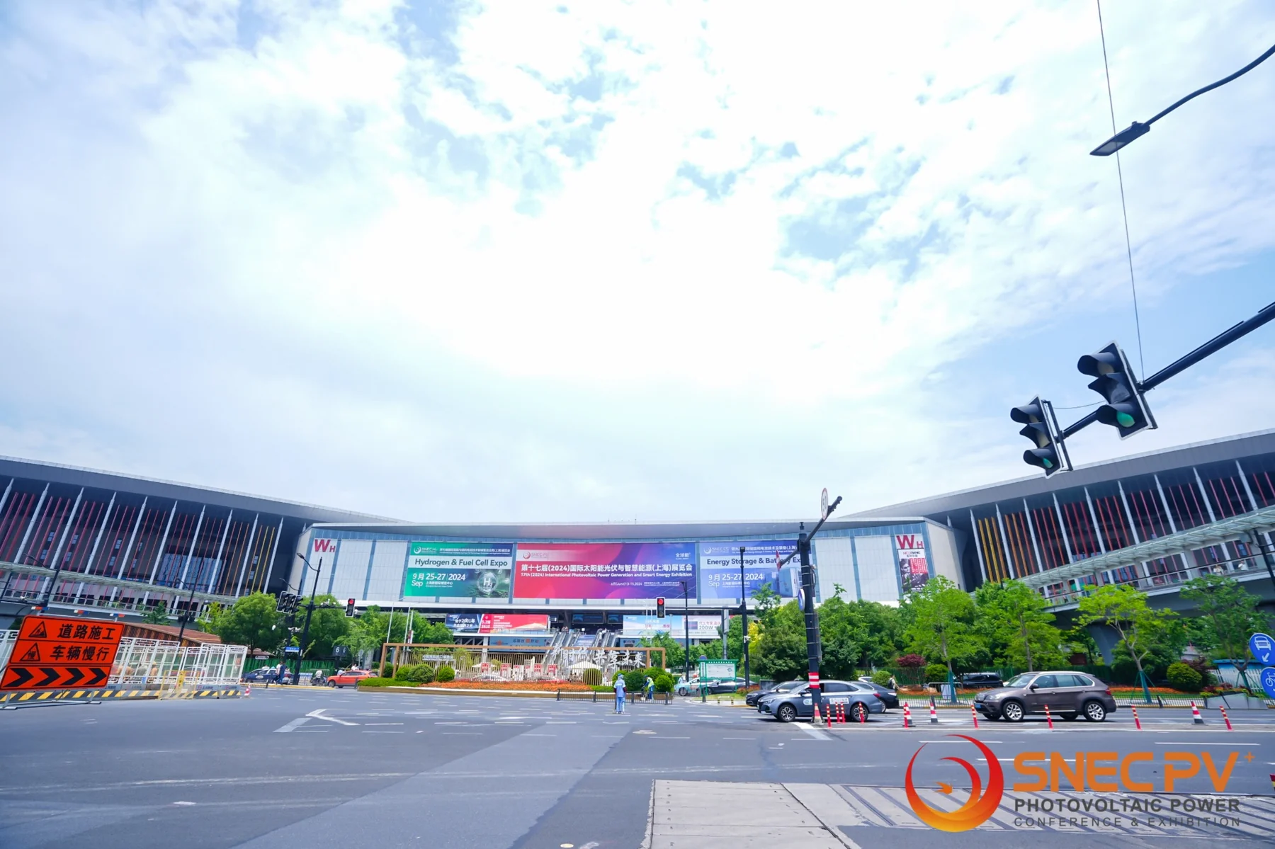 Exterior view of the SNEC Shanghai exhibition venue with event banners